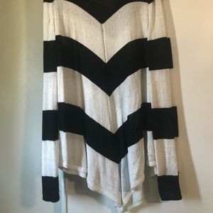 Jennifer Lopez black and white sweater